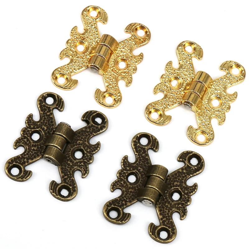 Two decorative brass box hinges with intricate vintage design, suitable for jewelry boxes, wooden cases, wine boxes, and cabinets.