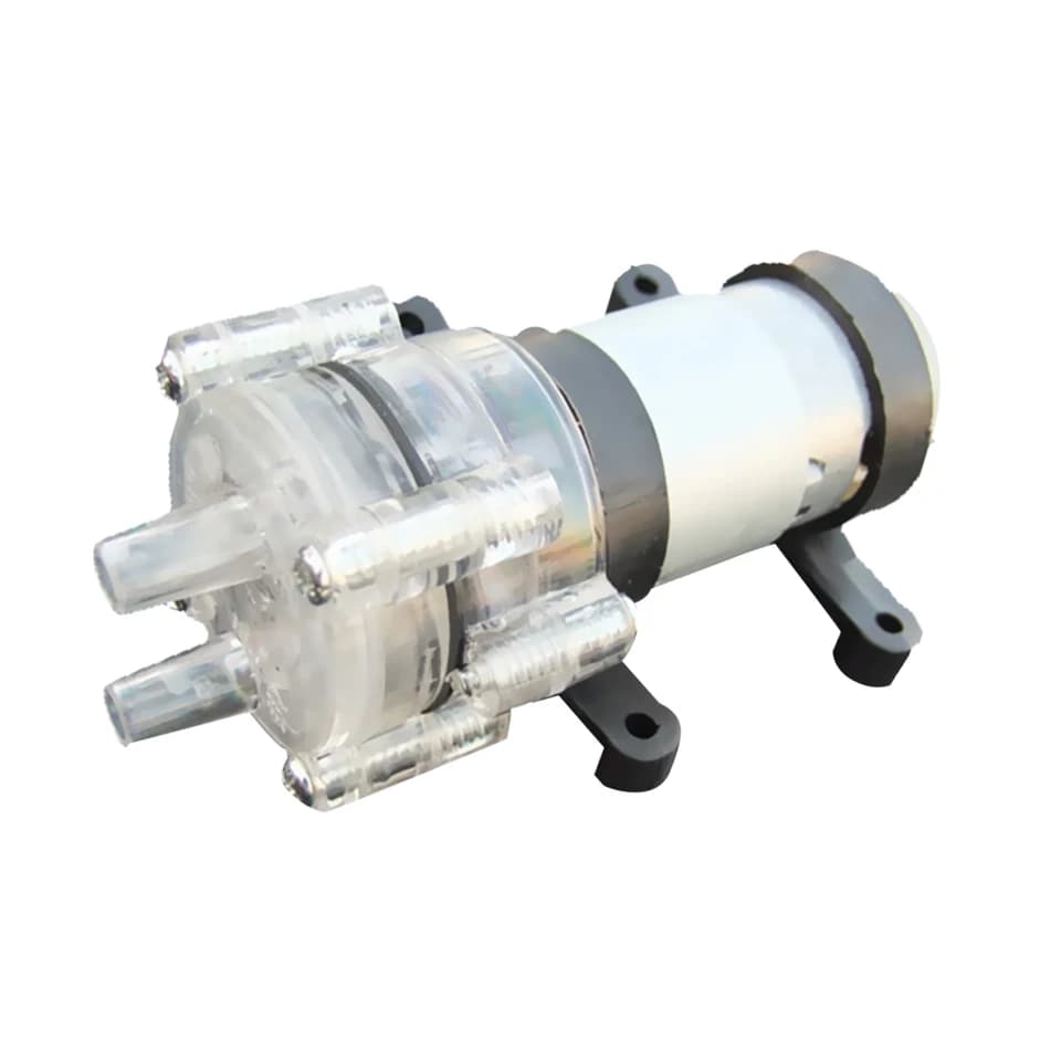 Condensate pump, small and compact, on a clean white background.