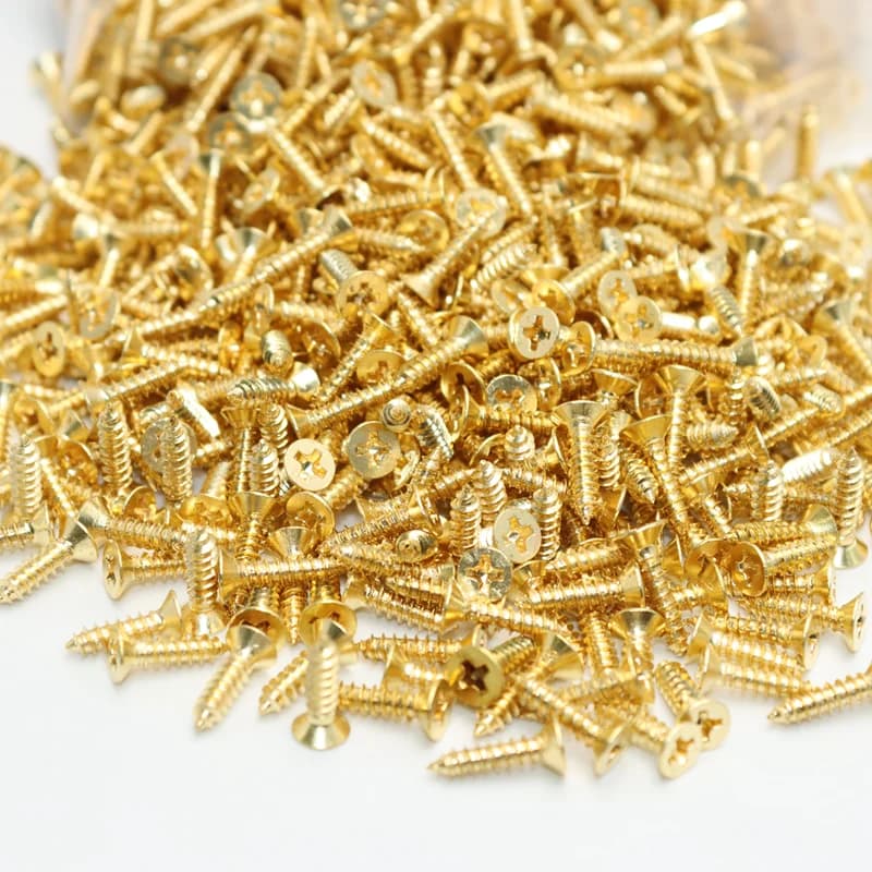 Pure brass cross recessed countersunk flat head tapping screws in sizes M2 through M5, suitable for wood furniture and self-tapping applications.