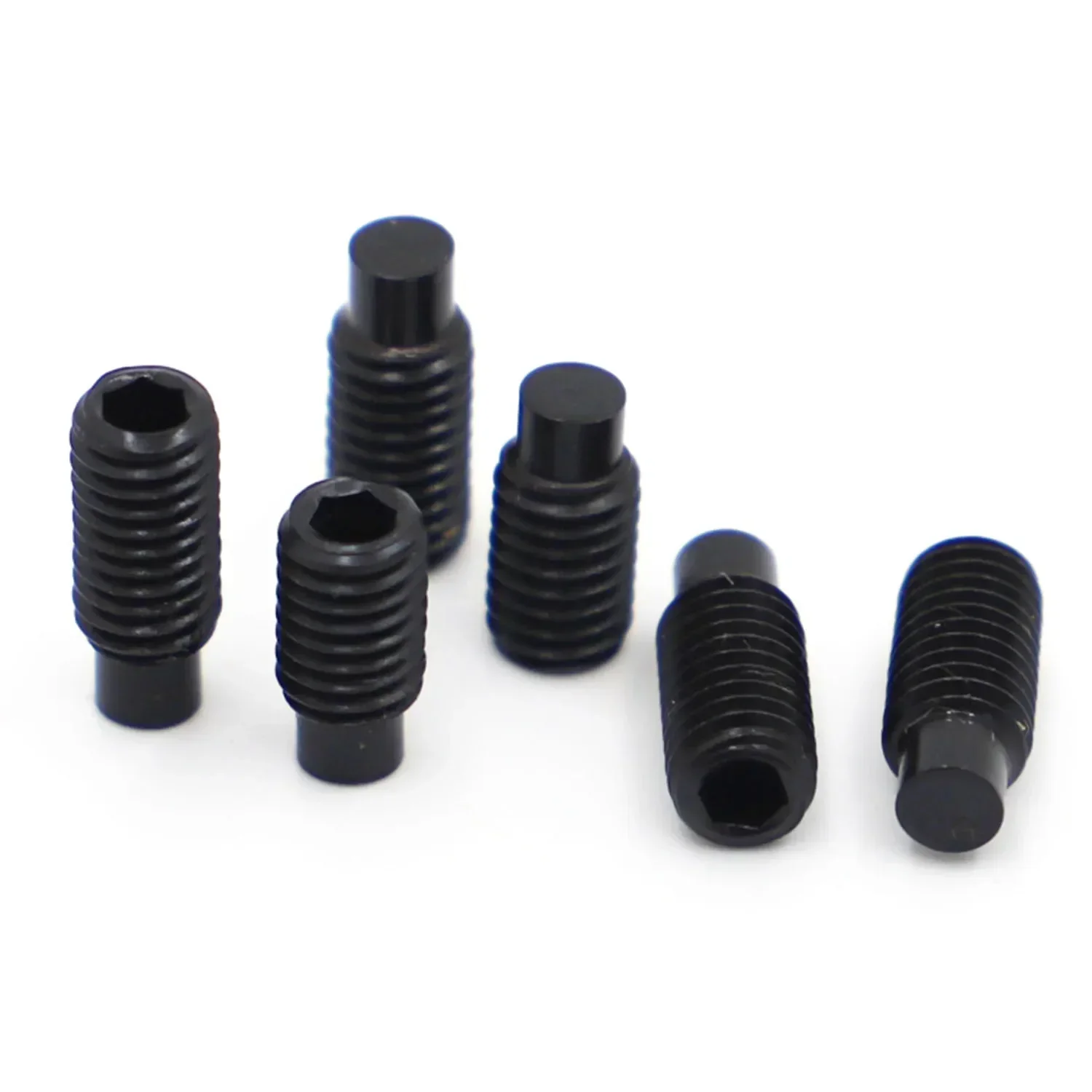Assorted black steel socket set screws (grub screws) with dog point convex ends in sizes from M2.5 to M16.