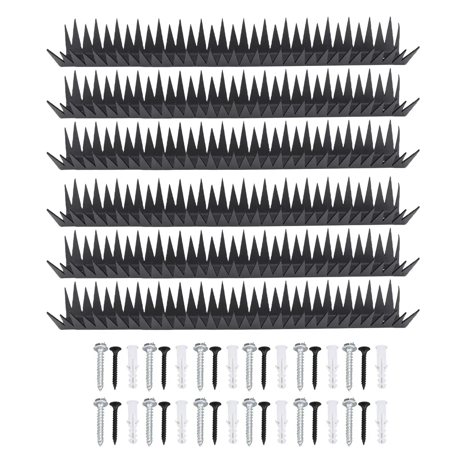 Metal spikes fence components: anti-bird spikes, screws, and anchors on white.
