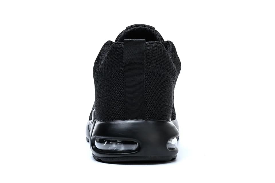 Work & safety shoes: single black shoe on a plain white background.