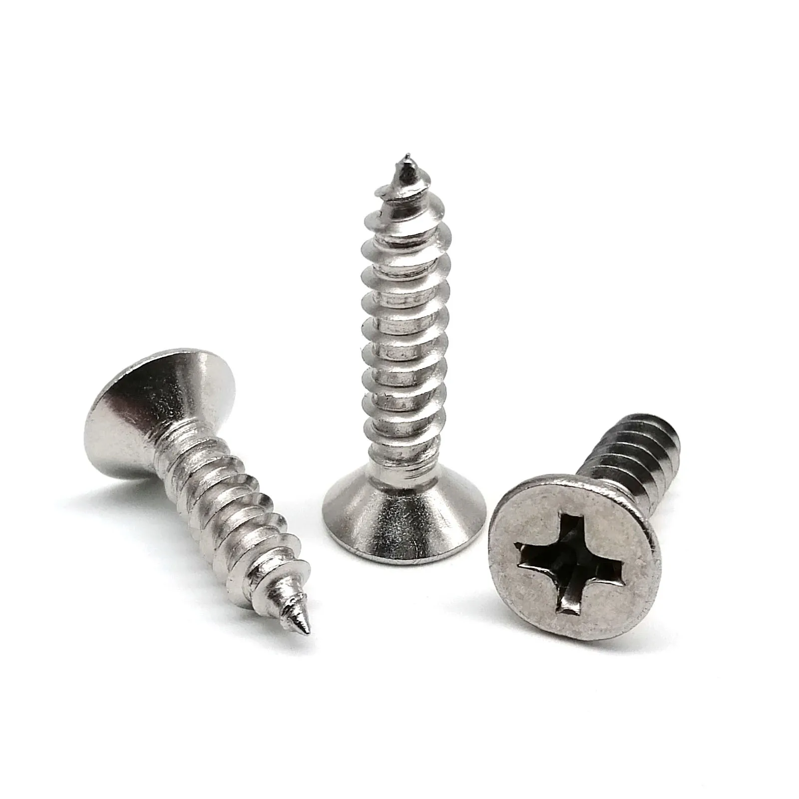 Stainless steel Phillips flat countersunk self-tapping wood screws in various metric sizes from M2 to M6.3 for woodworking projects.