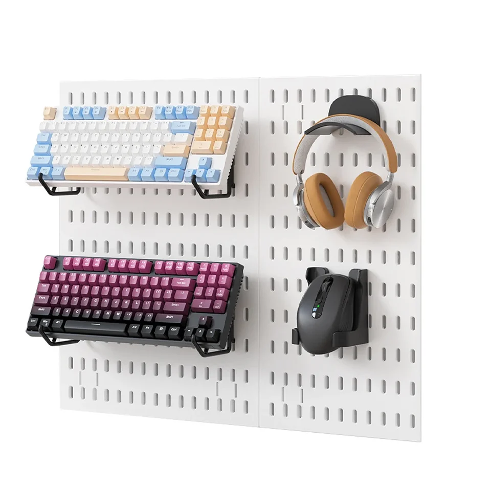 Pegboard Wall Organiser Panel with computer peripherals on a white background.