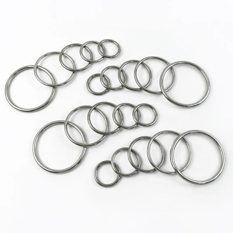 Multiple sets of d rings in various sizes on a white background.