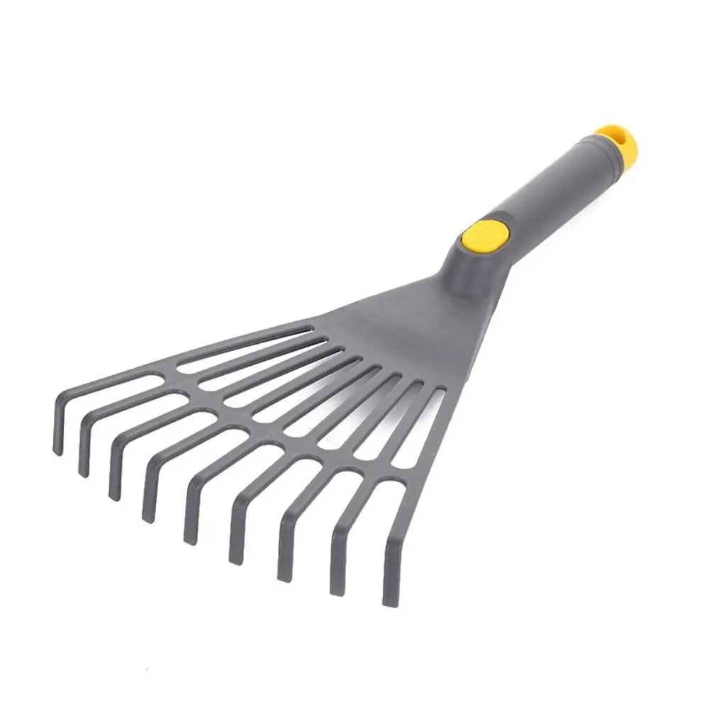 Lightweight plastic leaf rake with comfortable handle, ideal for safely gathering fallen leaves and leveling grass on lawns and garden beds.