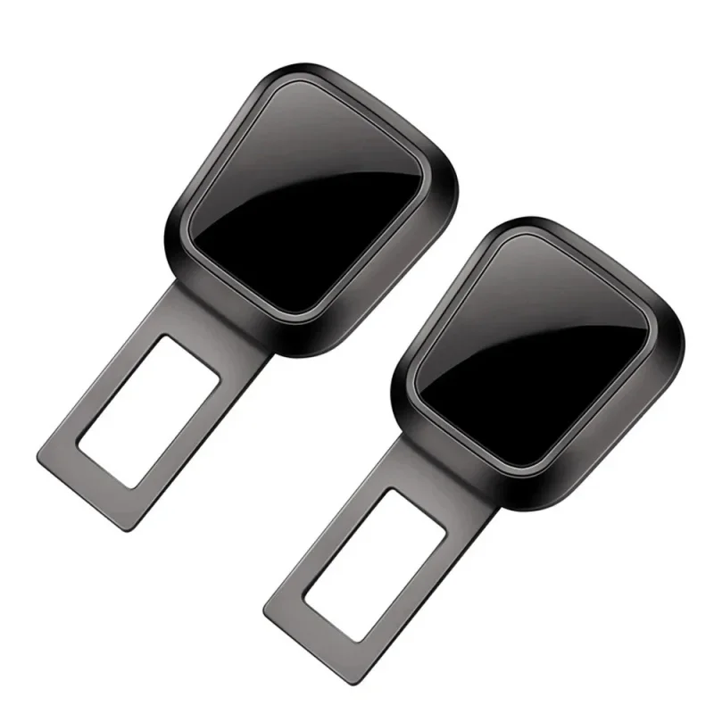 A set of two black car seat belt extenders with thick insert sockets, designed for Tesla and Porsche, enhancing safety and comfort.