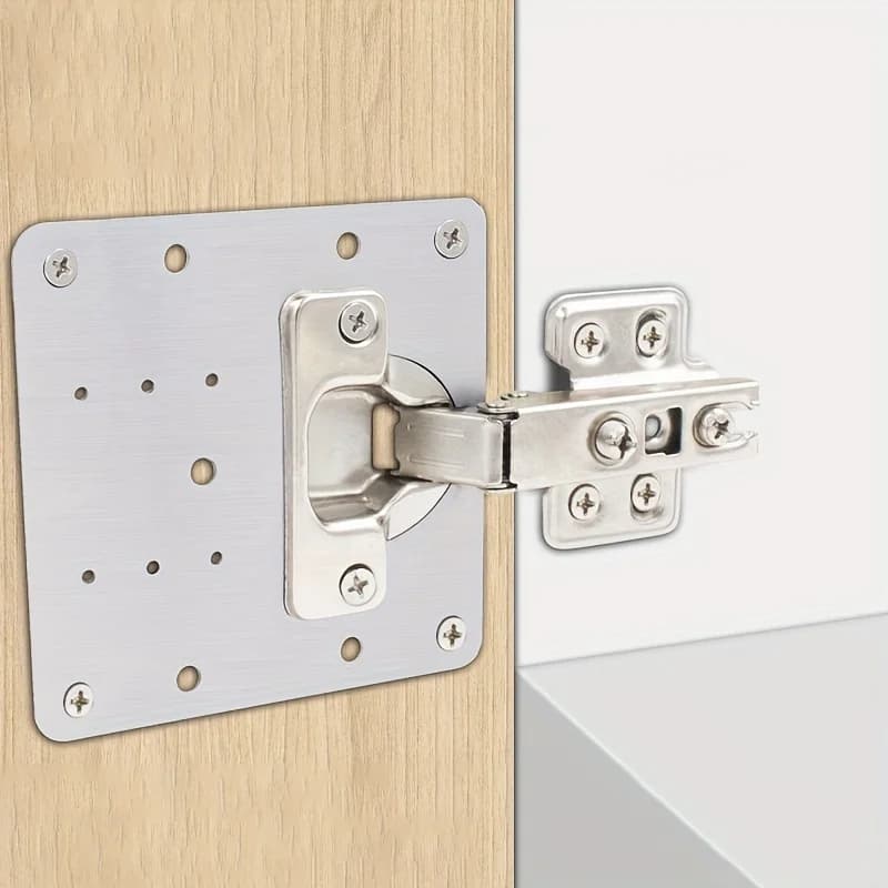 Stainless steel cabinet hinge repair plate for fixing kitchen or storage cabinet doors. Set includes 1/4 pieces of durable hardware.