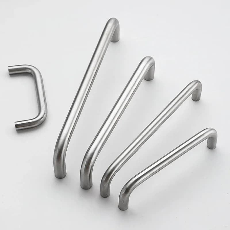 Stainless steel U-handle with a round profile, designed for wardrobe and cabinet doors, made from welded sheet metal.