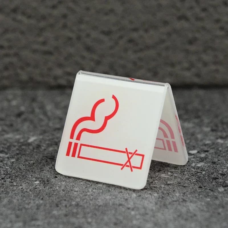 No Entry Table Sign: single 'no smoking' sign on a plain, light background.
