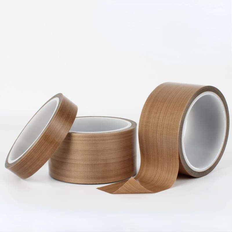 PTFE thread tape: three brown rolls on a white background.