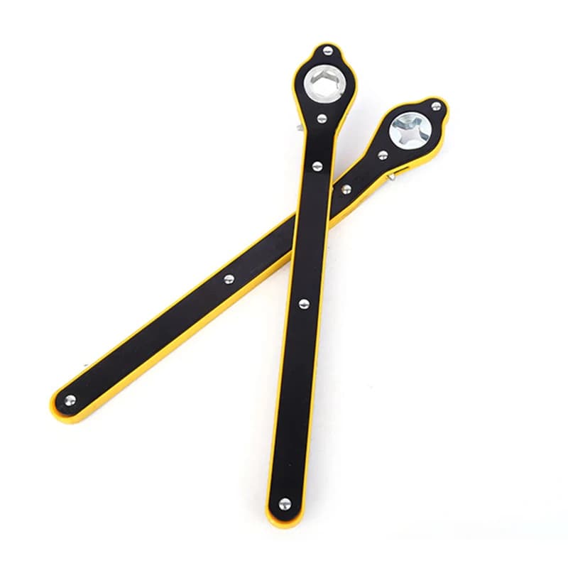A robust car labor-saving jack ratchet wrench, an essential tool for using a car jack for changing tires, displayed on a garage floor.