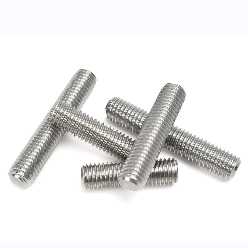 Ground Screw Rods: multiple metal threaded rods on a white background.
