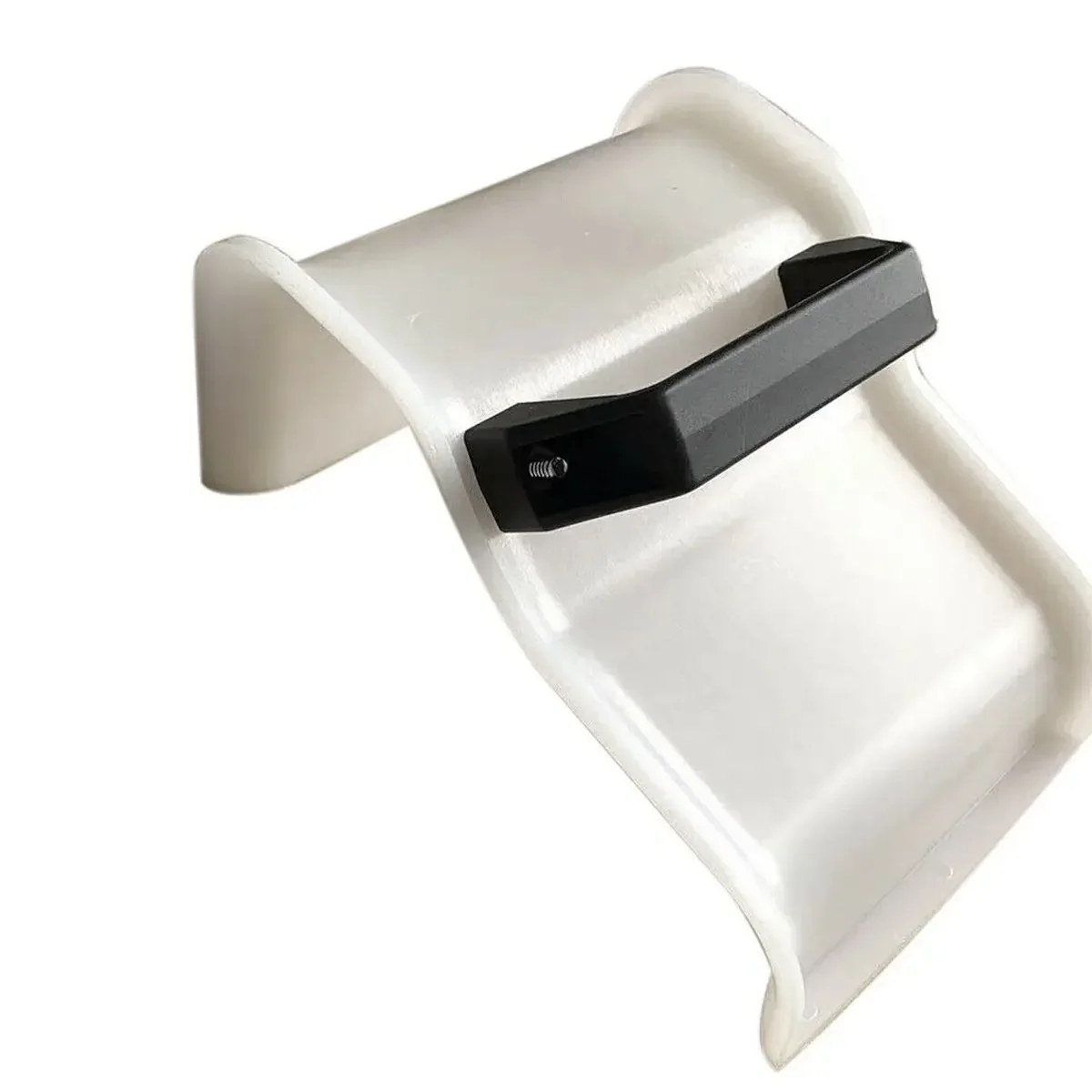 Professional concrete trowel with ergonomic plastic handle for plastering, masonry, and landscaping projects in garden or yard.