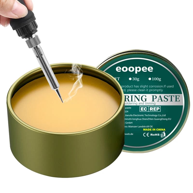 Professional no-clean rosin flux solder paste in a syringe, essential for welding and soldering electronic circuit boards.