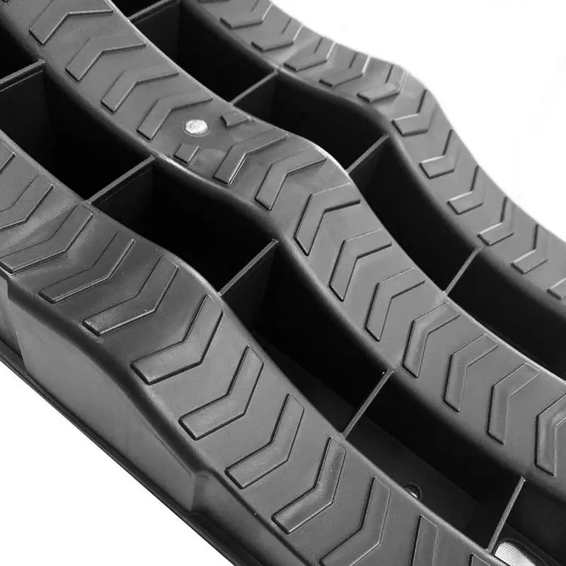 Two lightweight, 3-step RV wheel chocks and levelers, perfect for stabilizing campers and trailers.