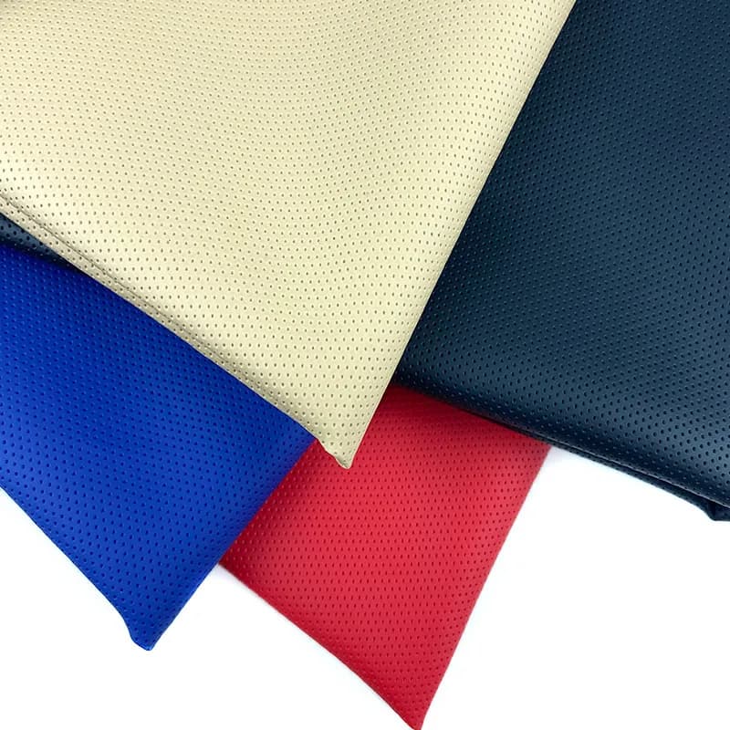 Frosted Faux Leather Fabric swatches, perforated, in various colours on white.
