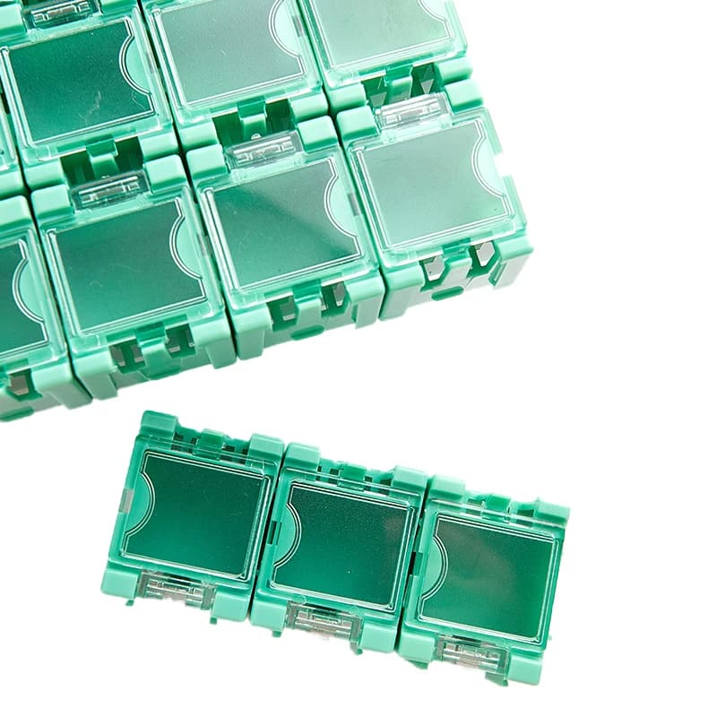 50pc SMD Component Storage Boxes: multiple green modular containers on a white background.