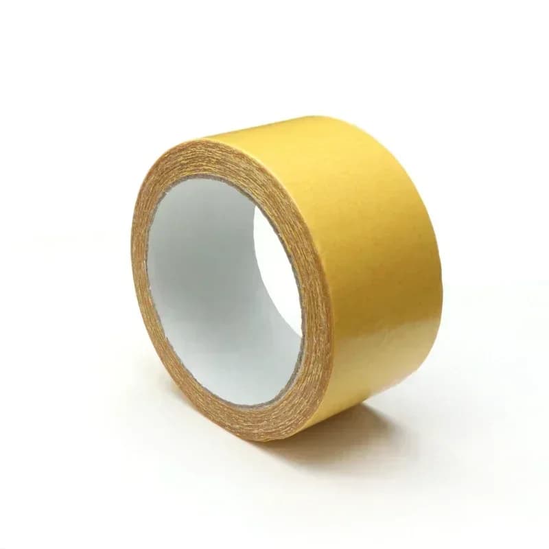 Packing tape: a single roll of double-sided tape on a white background.