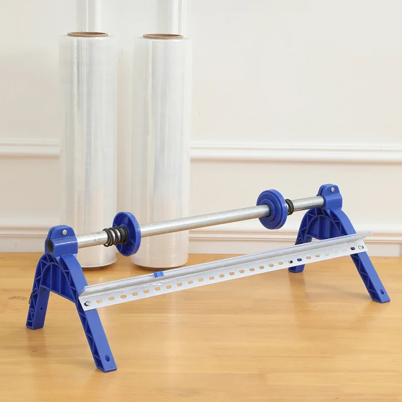 Wall-mounted commercial wrapping film packaging machine with manual crank, cuttable film blade, and sturdy metal construction for industrial use.