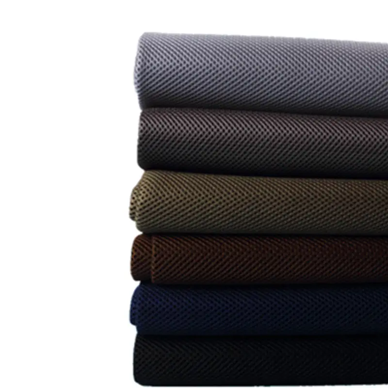Cordura Fabric Speaker Grille Cloth rolls in various colours, stacked vertically.