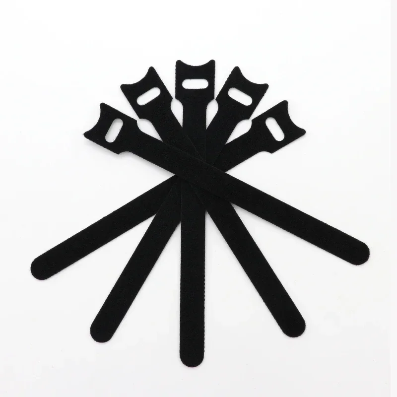 T-Type Cavity Wall Ties: multiple black ties arranged in a fan shape.