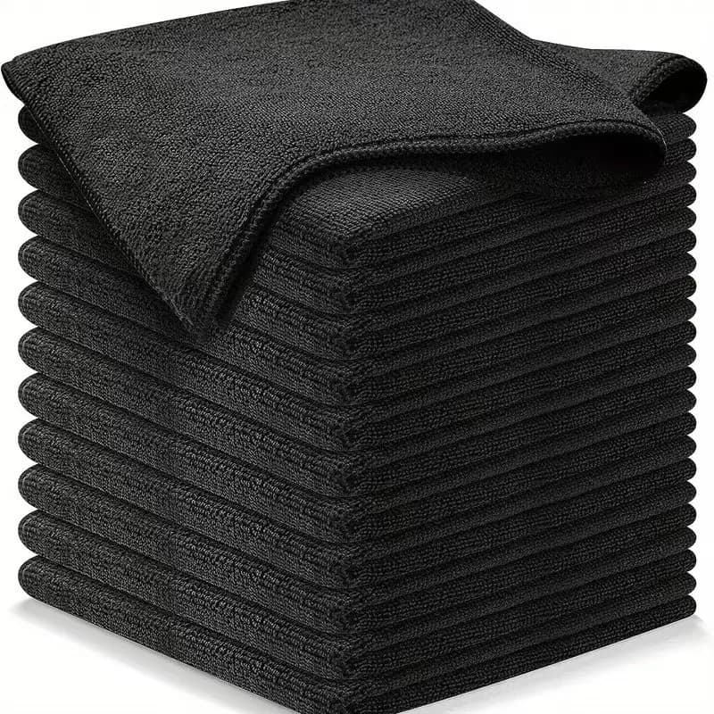Glass Cleaning Cloths: Stack of black microfiber cloths on a white background.