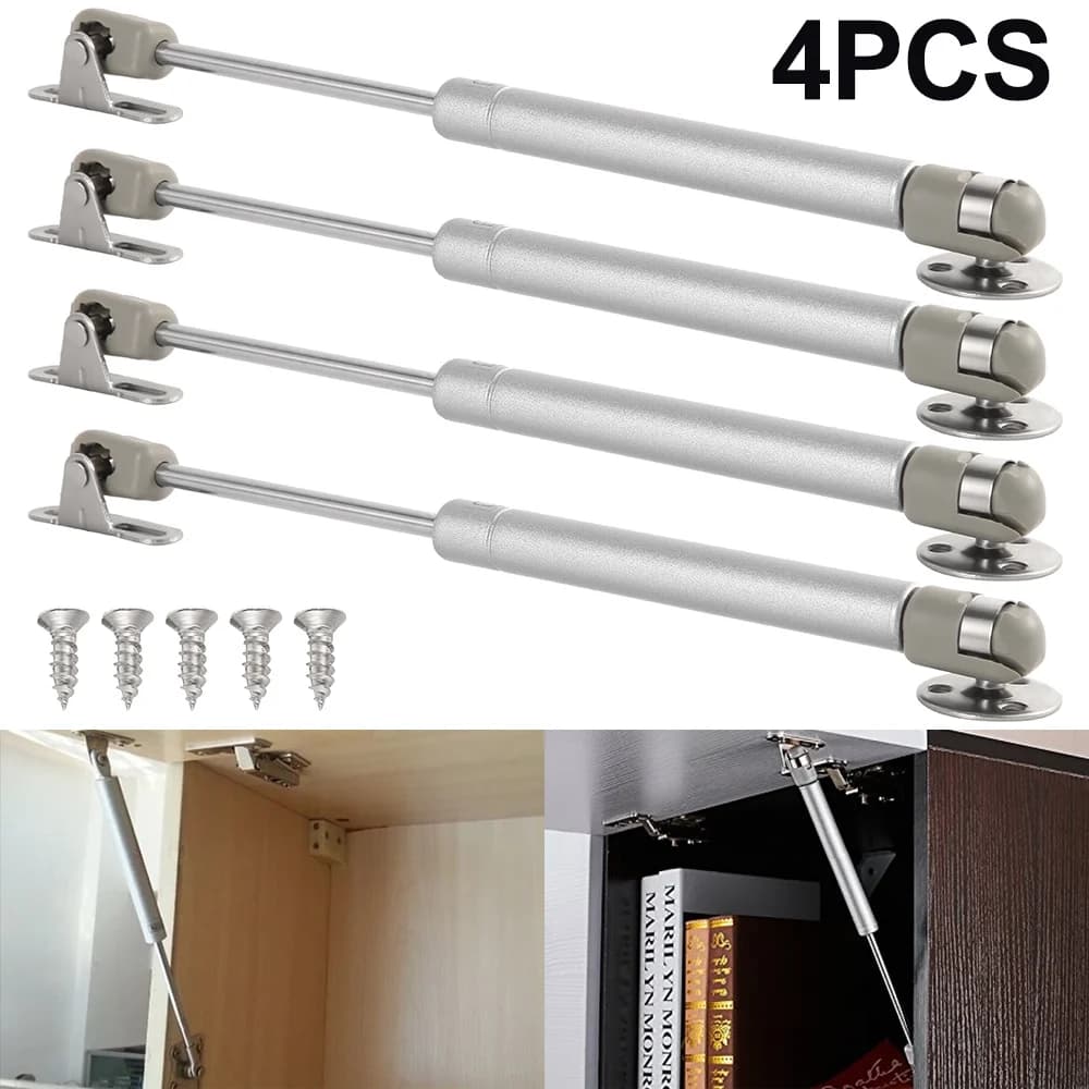 Four gas strut cabinet door lift supports with pneumatic hydraulic spring mechanism for kitchen cupboards and furniture.
