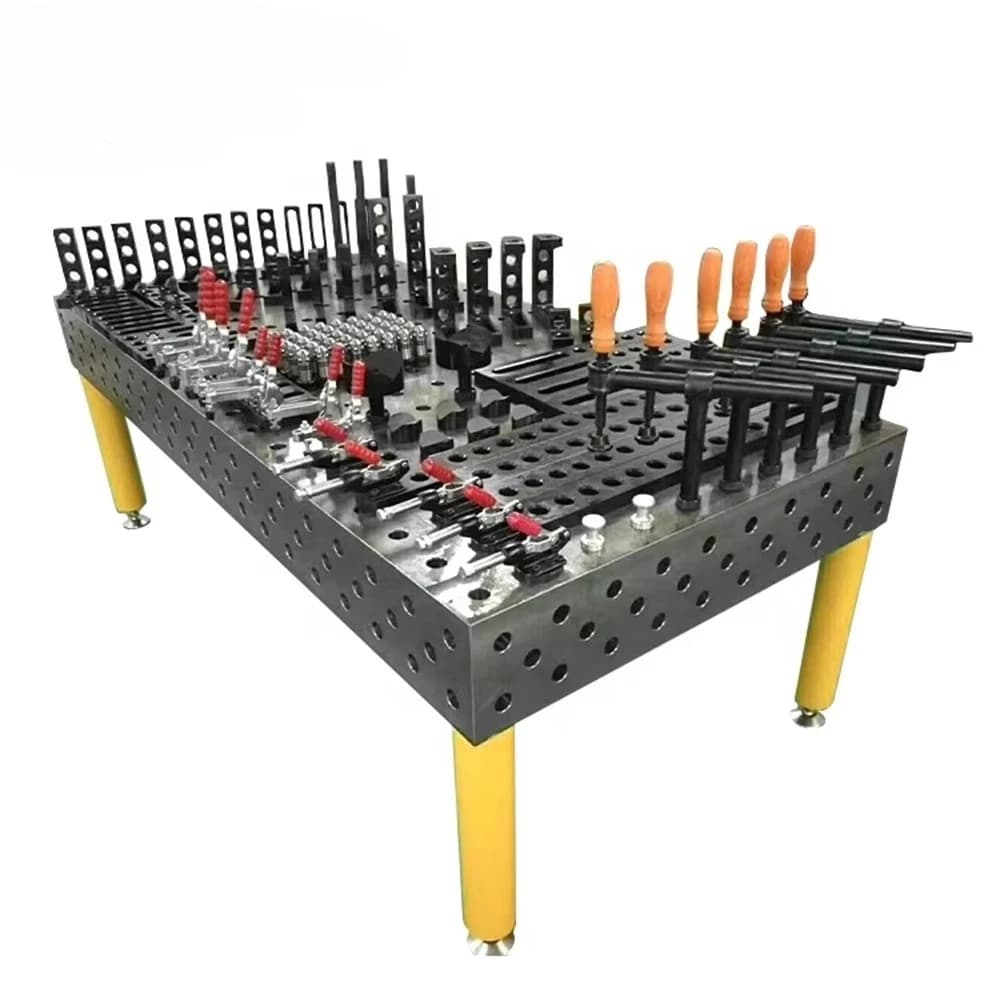 Premium 3D welding table with clamps and equipment, showing the solid steel construction and modular fixturing holes for precise metal fabrication.