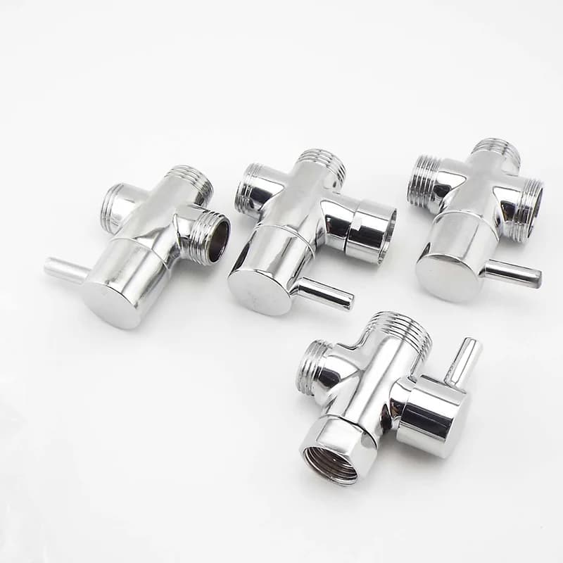 Toilet Siphon Diverter Valve: Four chrome-plated T-valves with handles.