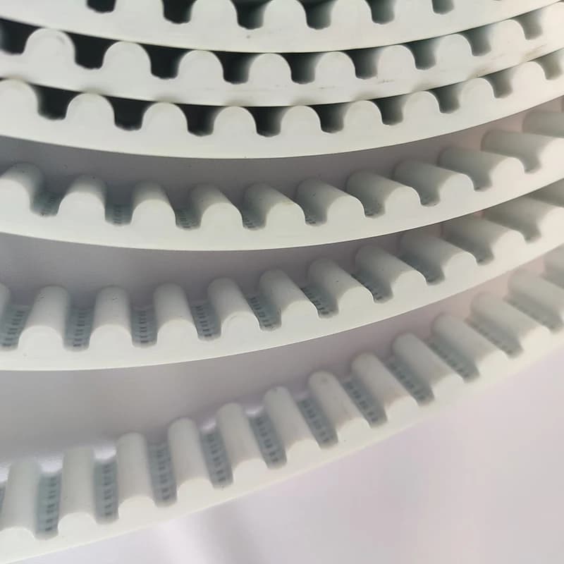 HTD8M Timing Belt: multiple rows of white toothed belt on a light background.