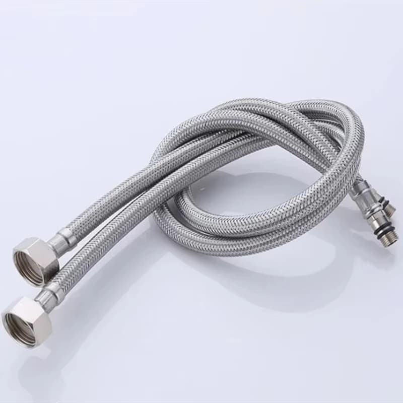 Washing Machine Drain Hose Pipe: single braided metal hose on a plain background.