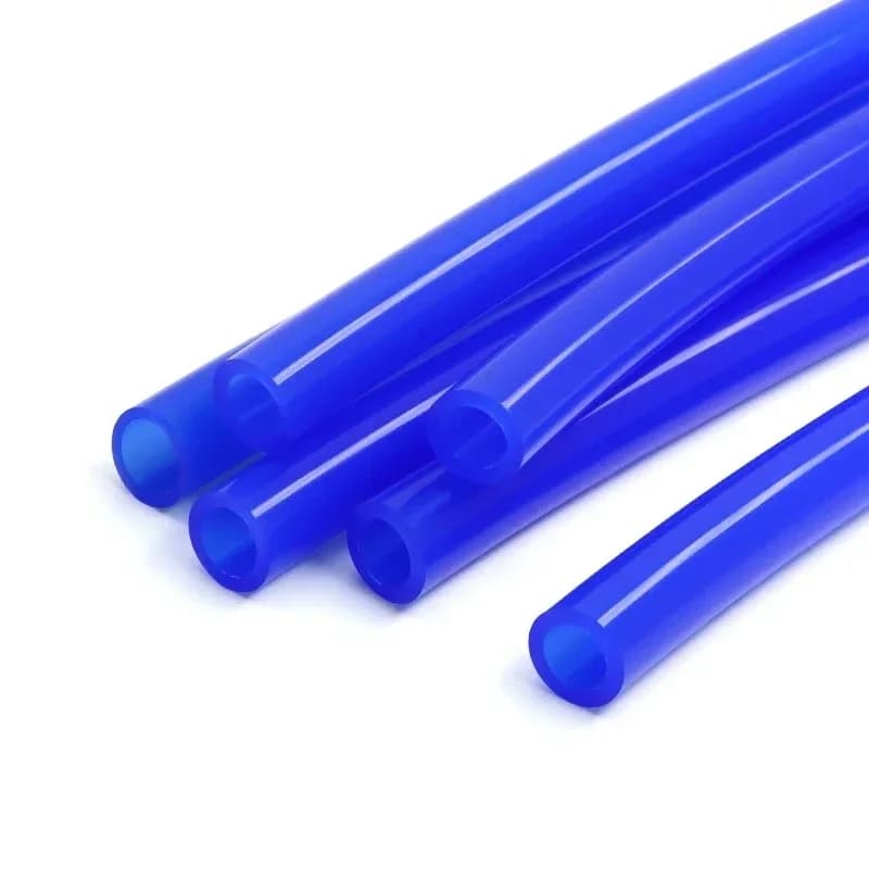 Washing machine hose: multiple blue tubes on a white background.