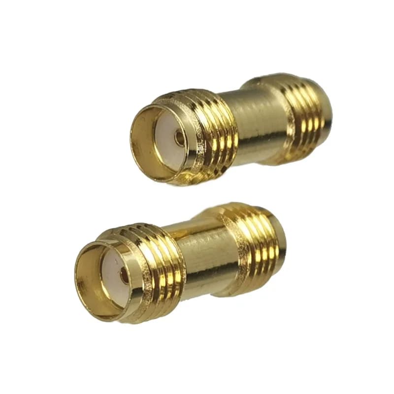 SMA to RP-SMA coaxial adapter converter with brass male plug and female jack for secure RF antenna connections