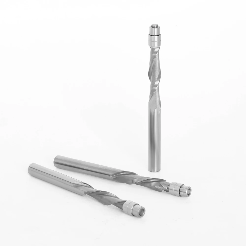 Solid carbide two-flute flush trim router bit with 6mm bearing guide and 6.35mm shank for precise woodworking and milling applications.