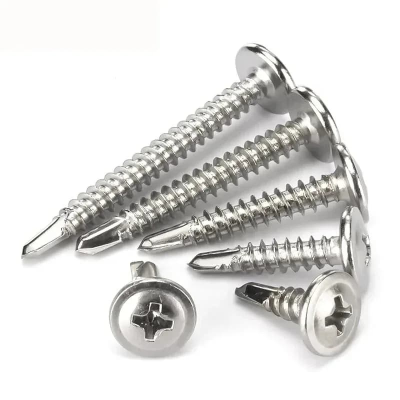 Stainless steel flat head self-tapping screws with Phillips truss head design for high-strength fastening in metal fabrication projects.