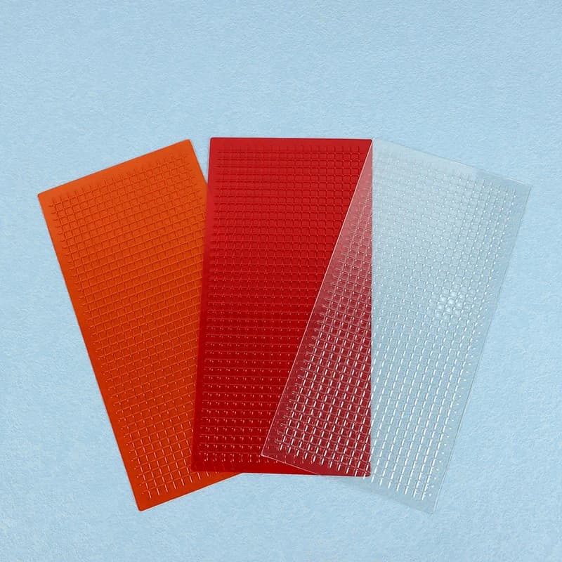 3 PCS Car Headlight Repair Kit with grid pattern film for DIY crack restoration on auto lenses, taillights, and headlights.