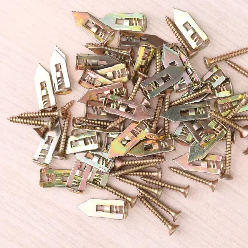Self-drilling metal expansion anchors for easy application in gypsum plasterboard and drywall without pre-drilling.
