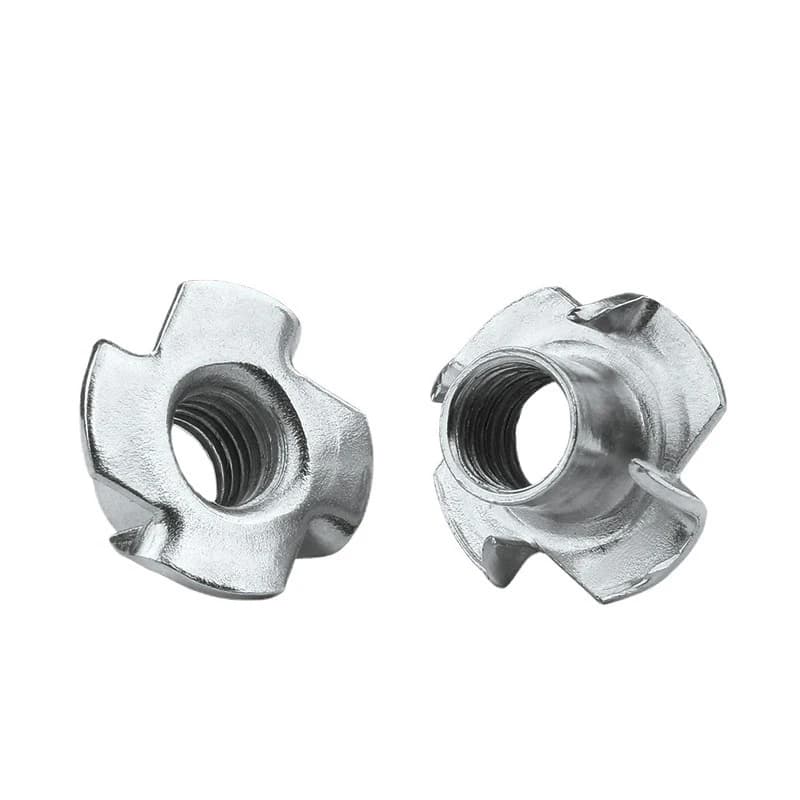 Four-claw T-nuts in sizes M3 to M12 for blind insertion into wood, commonly used in furniture assembly and hardware.