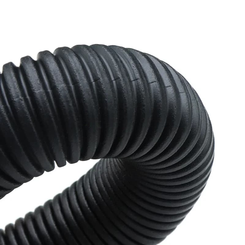 Black split loom conduit tubing for cable management, showing flexible plastic sleeve with easy-open seam for threading wires.