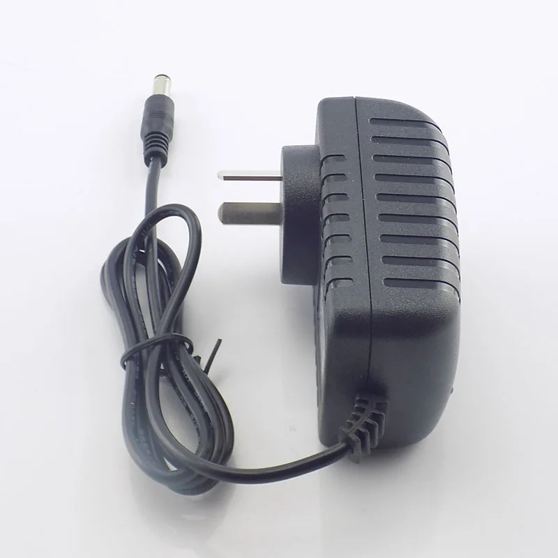 Australian AU plug 12V 2A AC DC power adapter charger for CCTV camera systems, shown with cable and plug.