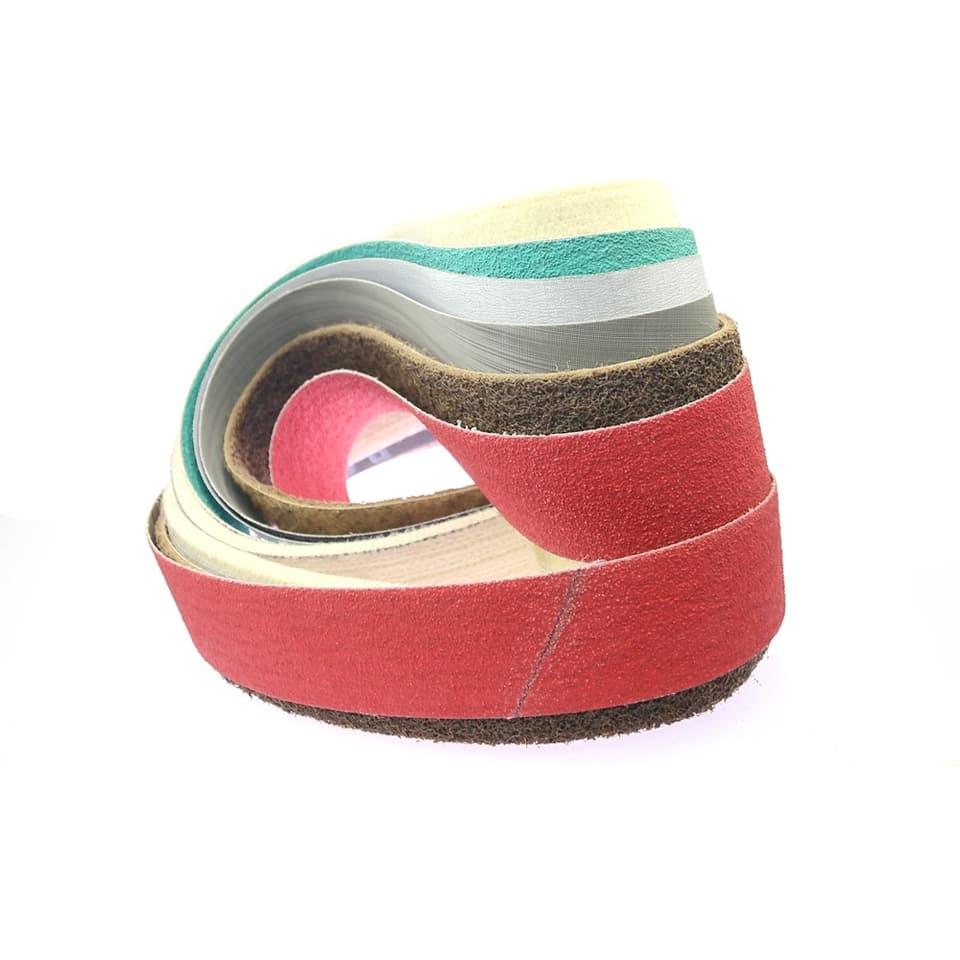 Abrasive sanding belts in various sizes for grinding and polishing hard metals and stainless steel.