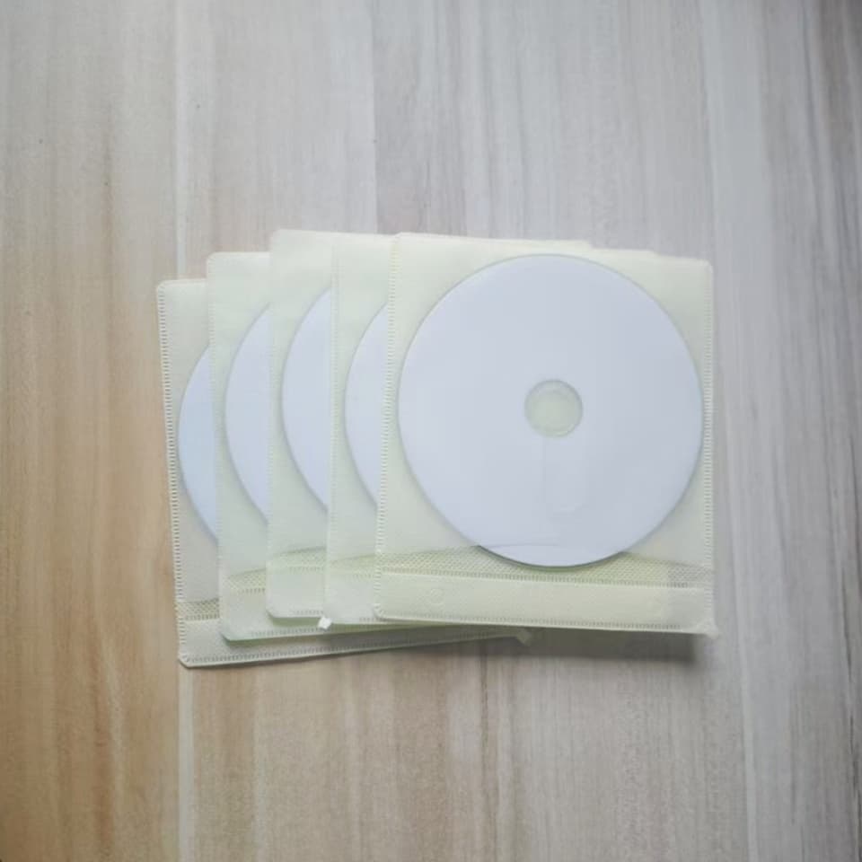 A stack of 10 blank blu ray disc 12cm BD-R printable recordable discs, 10X 25GB capacity.