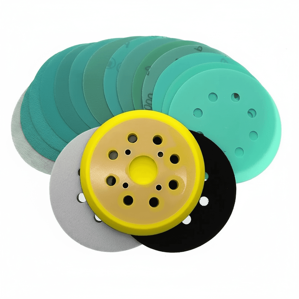 A set of 15 fibre sanding discs, 5 inches (125mm) with 8 holes, ranging from 60 to 2000 grit.