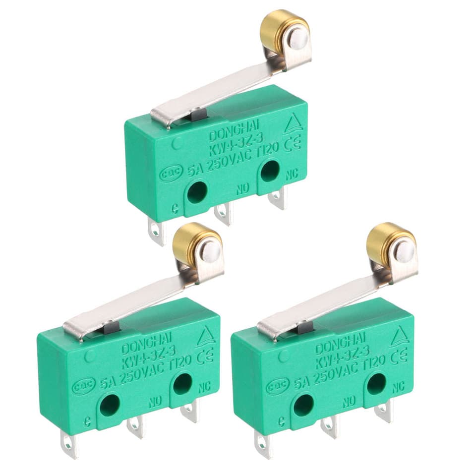 A set of three KW4-3Z-3 micro limit switch units with SPDT contacts and a hinge roller lever.