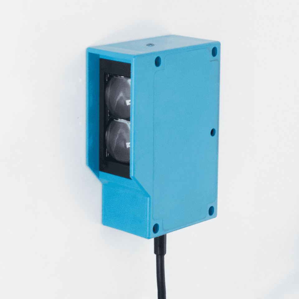 An E3K photoelectric sensor with a 20m detection distance and NPN PNP optical relay switch.