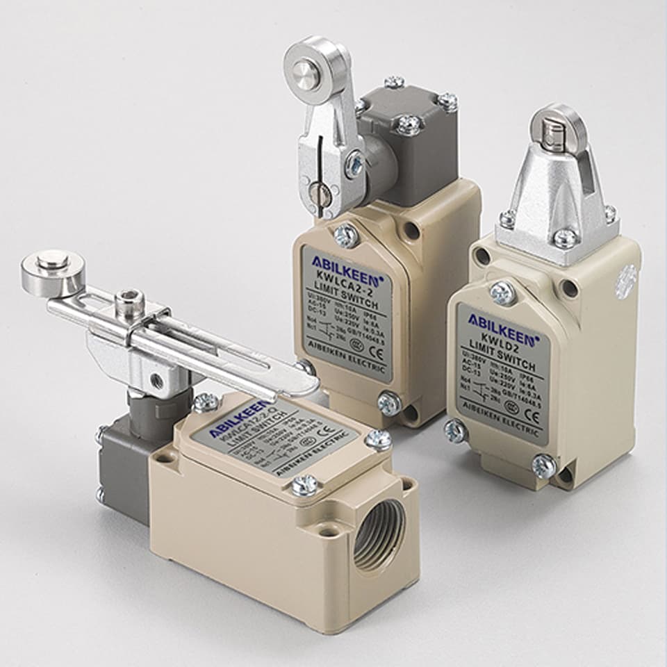 A silver ABILKEEN CNC industrial machine limit switch with a roller lever, designed for precise travel detection.
