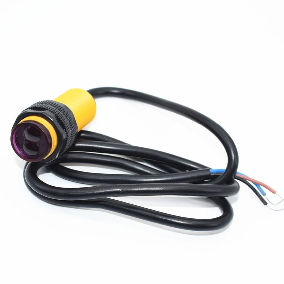Smart Car Robot E18-D80NK infrared obstacle avoidance photoelectric sensor, not a capacitive sensor.
