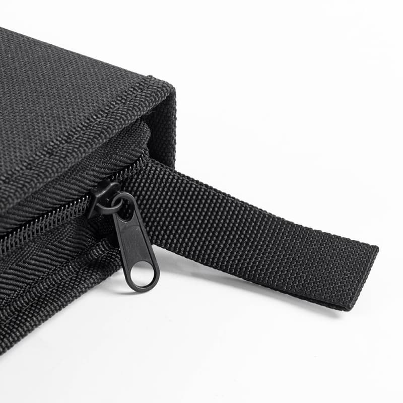 Portable black CD wallet with zipper closure, holding 40 discs, perfect for travel and home organization.