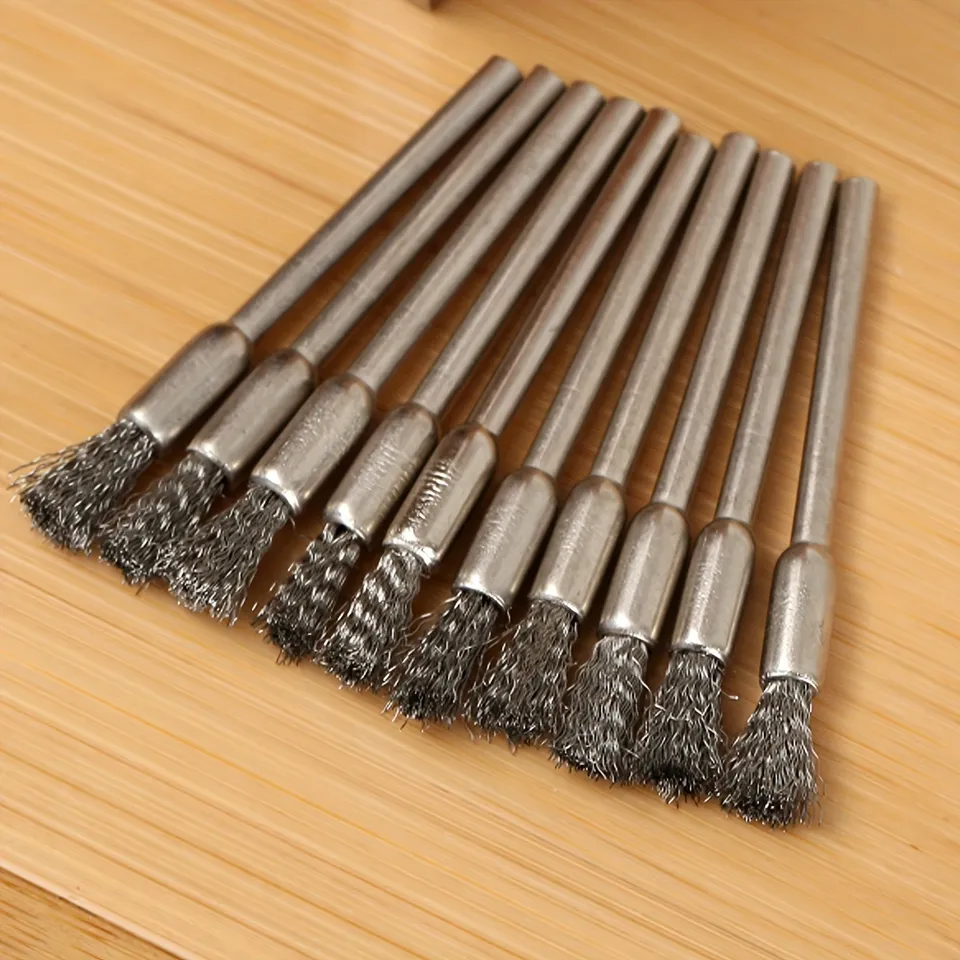 Ten stainless steel wire brushes with 3.17mm handles, perfect for cleaning and rust removal, an alternative to fibre sanding discs.